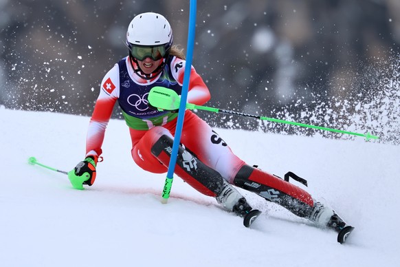 Switzerland's Camille Rast speeds down the course during an alpine ski, slalom portion of a women's team combined race, at the 2026 Winter Olympics, in Cortina d'Ampezzo, Italy, Tuesday ...