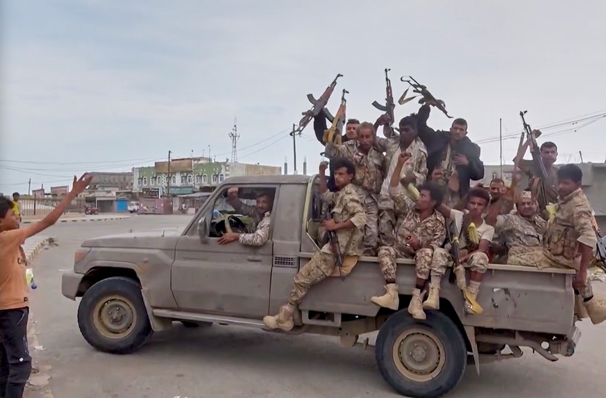 This image taken from undated video released by Al-Masirah TV, a channel owned by Yemen's Houthi rebels, on Friday, Sept. 11, 2026, shows, according to the channel, Houthi fighters chanting atop  ...
