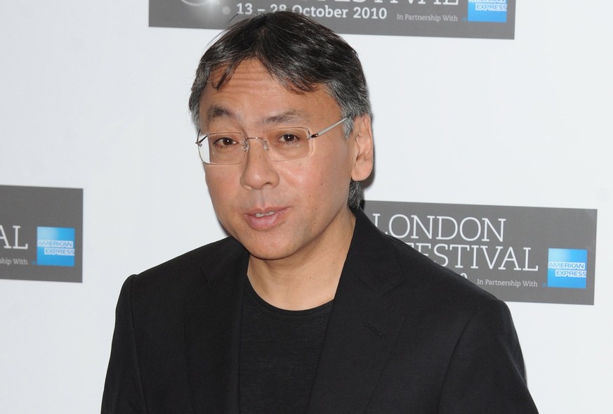 epa06245900 (FILE) - Japanese writer, screenwriter for the film, Kazuo Ishiguro, poses for photographers during the BFI London Film Festival: &#039;Never Let Me Go&#039; photocall held at the Vue West ...