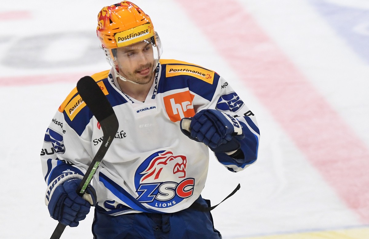 ZSC's Postfinance Topscorer Denis Malgin celebrates the 1-4 goal during the preliminary round game of the National League 2020/21 between HC Lugano against ZSC Lions at the Corner Arena in Lugano ...
