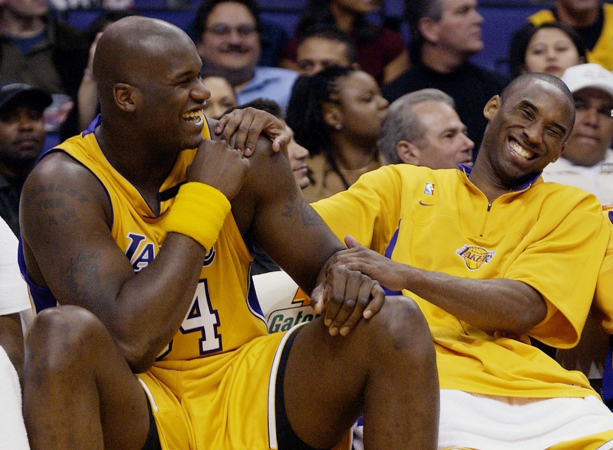 FILE - In this April 15, 2003, file photo, Los Angeles Lakers Shaquille O'Neal, left, and Kobe Bryant share a laugh on the bench while their teammate take on the Denver Nuggets during the fourth  ...