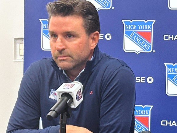 New York Rangers general manager Chris Drury, left, and new head coach Mike Sullivan speak with reporters during an NHL hockey news conference, Wednesday, Sept. 17, 2025, in Tarrytown, N.Y. (AP Photo/ ...