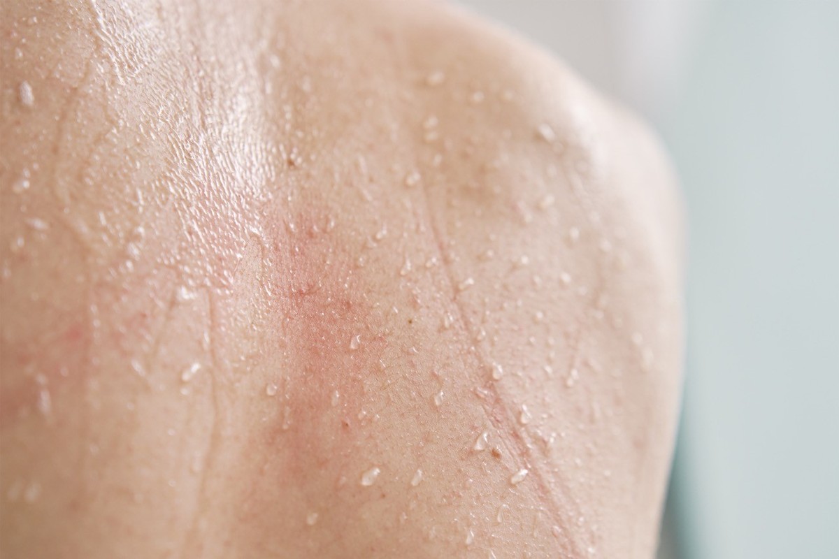 Water drops at skin. Close up shot of naked female body skin with water drops in shower. Hygiene concept xkwx body woman skin drop wet naked water back hygiene beauty shoulder care detail wellness rea ...