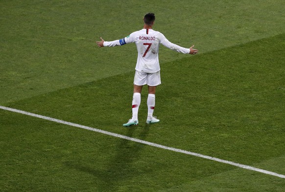 Portugal&#039;s Cristiano Ronaldo spreads his arms during the round of 16 match between Uruguay and Portugal at the 2018 soccer World Cup at the Fisht Stadium in Sochi, Russia, Saturday, June 30, 2018 ...