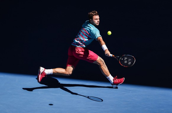 epa05740462 Stan Wawrinka of Switzerland in action against Andreas Seppi of Italy during their Men&#039;s Singles round four match at the Australian Open Grand Slam tennis tournament in Melbourne, Aus ...