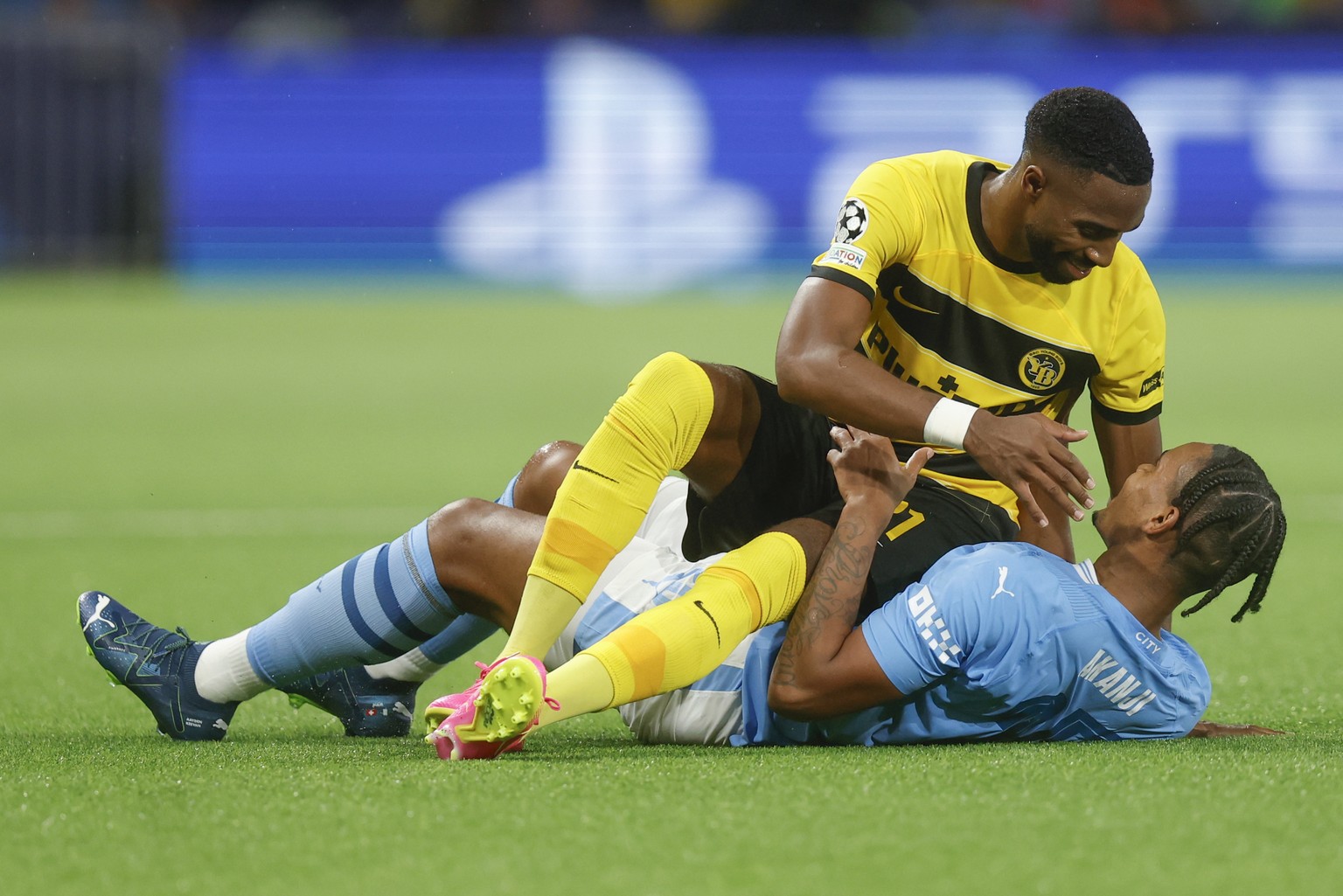 YB&#039;s Ulisses Garcia, left, and Manchester City&#039;s Manuel Akanji react as they both fall, during the UEFA Champions League group G soccer match between Switzerland&#039;s BSC Young Boys and En ...