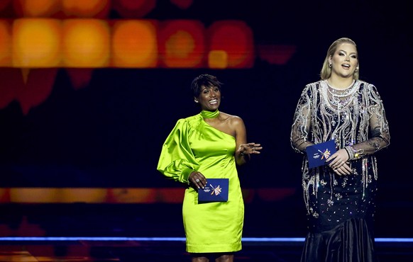 epa09212210 Edsilia Rombley (L) and Nikkie de Jager host the first dress rehearsal for the Second Semi-Final of the 65th annual Eurovision Song Contest (ESC) at the Rotterdam Ahoy arena, in Rotterdam, ...