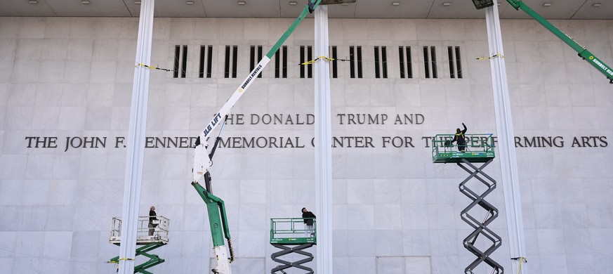 FILE - New signage, The Donald J. Trump and The John F. Kennedy Memorial Center For The Performing Arts, is unveiled on the Kennedy Center in Washington, Dec. 19, 2025. (AP Photo/Jacquelyn Martin), Fi ...