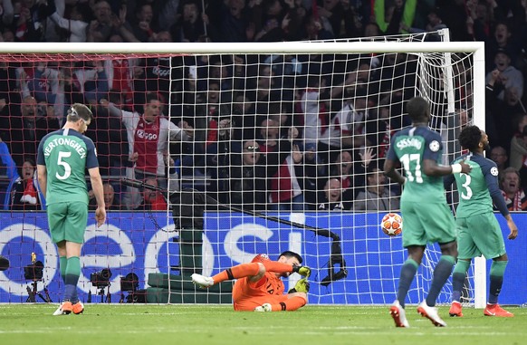 Tottenham goalkeeper Hugo Lloris, center, failing to stop the goal scored by Ajax&#039;s Hakim Ziyech during the Champions League semifinal second leg soccer match between Ajax and Tottenham Hotspur a ...