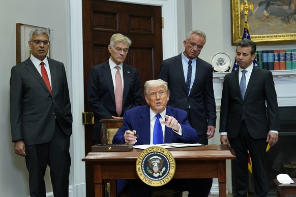 epa12094400 United States President Donald J. Trump (C) takes questions during a press conference in the Roosevelt Room of the White House in Washington, DC, USA, 12 May 2025. Trump addresses the high ...