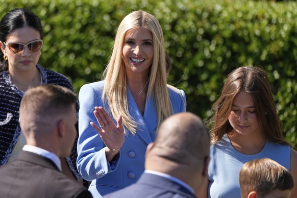 Ivanka Trump, center, and her daughter Arabella Kushner, right, arrive before President Donald Trump welcomes the Super Bowl champion Philadelphia Eagles NFL football team to the South Lawn of the Whi ...