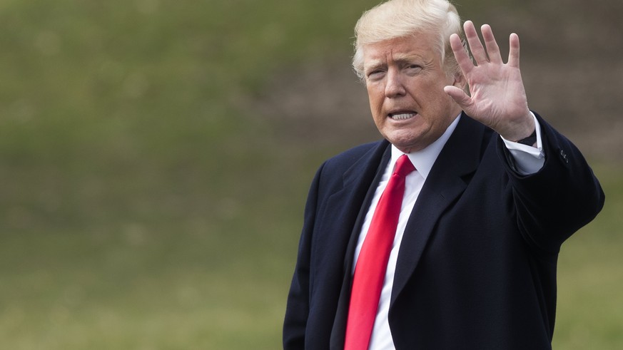 epa06636079 US President Donald J. Trump waves as he walks across the South Lawn of the White House to depart by Marine One, in Washington, DC, USA, 29 March 2018. Trump travels to Ohio to deliver rem ...