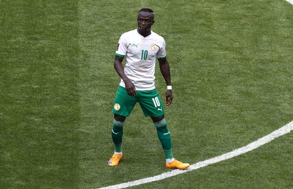 Senegal&#039;s Sadio Mane looks on during the World Cup 2022 - Africa playoff soccer match between Senegal and Egypt at at Stade Me Abdoulaye Wade stadium in Dakar, Senegal, Tuesday, March 29, 2022. ( ...