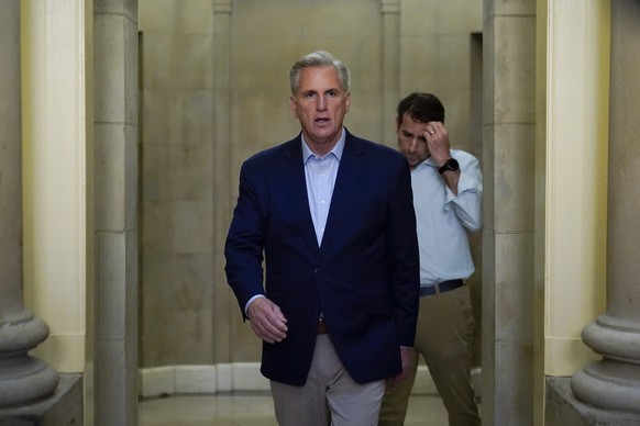 Speaker of the Kevin McCarthy, R- Calif., walks out of his office to speak with members of the press after participating in a phone call on the debt ceiling with President Joe Biden, Sunday, May 21, 2 ...