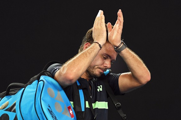 epa06449599 Stan Wawrinka of Switzerland reacts after losing his second round match against Tennys Sandgren of the USA at the Australian Open Grand Slam tennis tournament in Melbourne, Australia, 18 J ...