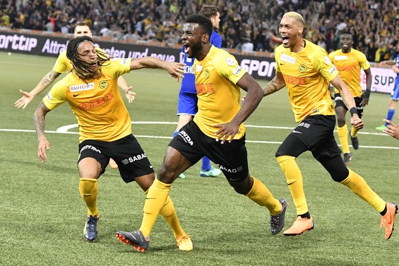 YB&#039;s Jean-Pierre Nsame, center, celebrates his winning goal with Kevin Mbabu, left, and Guillaume Hoarau, right, during their Super League match of BSC Young Boys against FC Luzern, at the Stade  ...