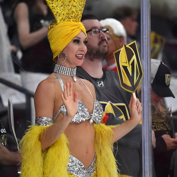 LAS VEGAS, NV - MAY 30: A Vegas Showgirl rallies the crowd prior to game 2 of the Stanley Cup Final between the Washington Capitals and the Las Vegas Golden Knights on May 30, 2018 at T-Mobile Arena i ...