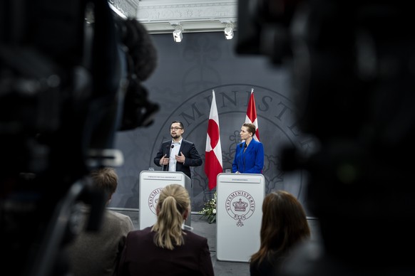 epa11817242 Denmark&#039;s Prime Minister Mette Frederiksen (R) and Greenland&#039;s Prime Minister Mute Bourup Egede (L) hold a joint press conference in the Mirror Hall of Christiansborg Palace in C ...