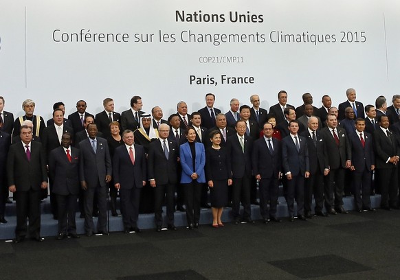 epa08873909 (FILE) World leaders pose for the family photo at the 2015 COP21 World Climate Change Conference in Le Bourget, north of Paris, France, November 30, 2015 (republished December 10, 2020).  On 12...