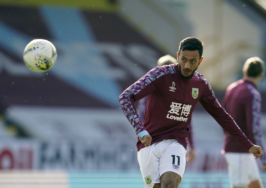 Burnley&#039;s Dwight McNeil kicks the ball during warm up before the English League Cup soccer match between Burnley and Sheffield United at the Turf Moor stadium in Burnley, England, Thursday, Sept. ...
