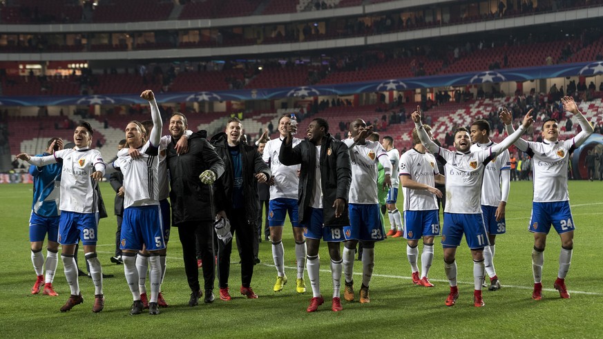 Basel&#039;s players cheer after winning the UEFA Champions League Group stage Group A matchday 6 soccer match between Portugal&#039;s SL Benfica and Switzerland&#039;s FC Basel 1893 in Benfica&#039;s ...