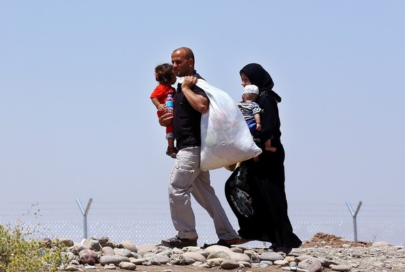 Eine Familie aus Mossul auf dem Weg in die Kurdenprovinz.