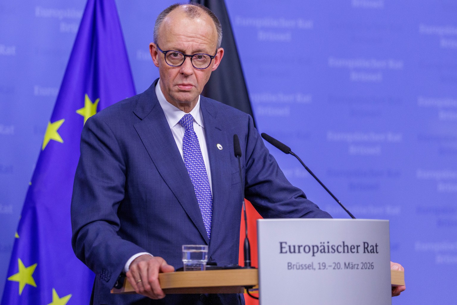 epa12834855 German Chancellor Friedrich Merz speaks to the media during a press conference concluding a formal meeting of the members of the European Council in Brussels, Belgium, 19 March 2026. Leade ...
