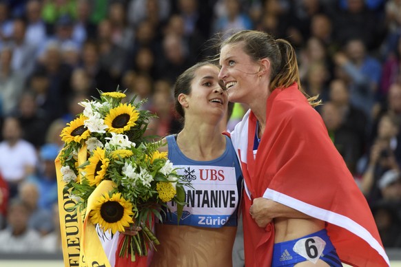 CAPTION CORRECTION CORRECTS FIRST NAME OF RUNNER --- Lea Sprunger, right, and Petra Fontanive of Switzerland, both of Switzerland react after the women&#039;s 200m race, during the Weltklasse IAAF Dia ...