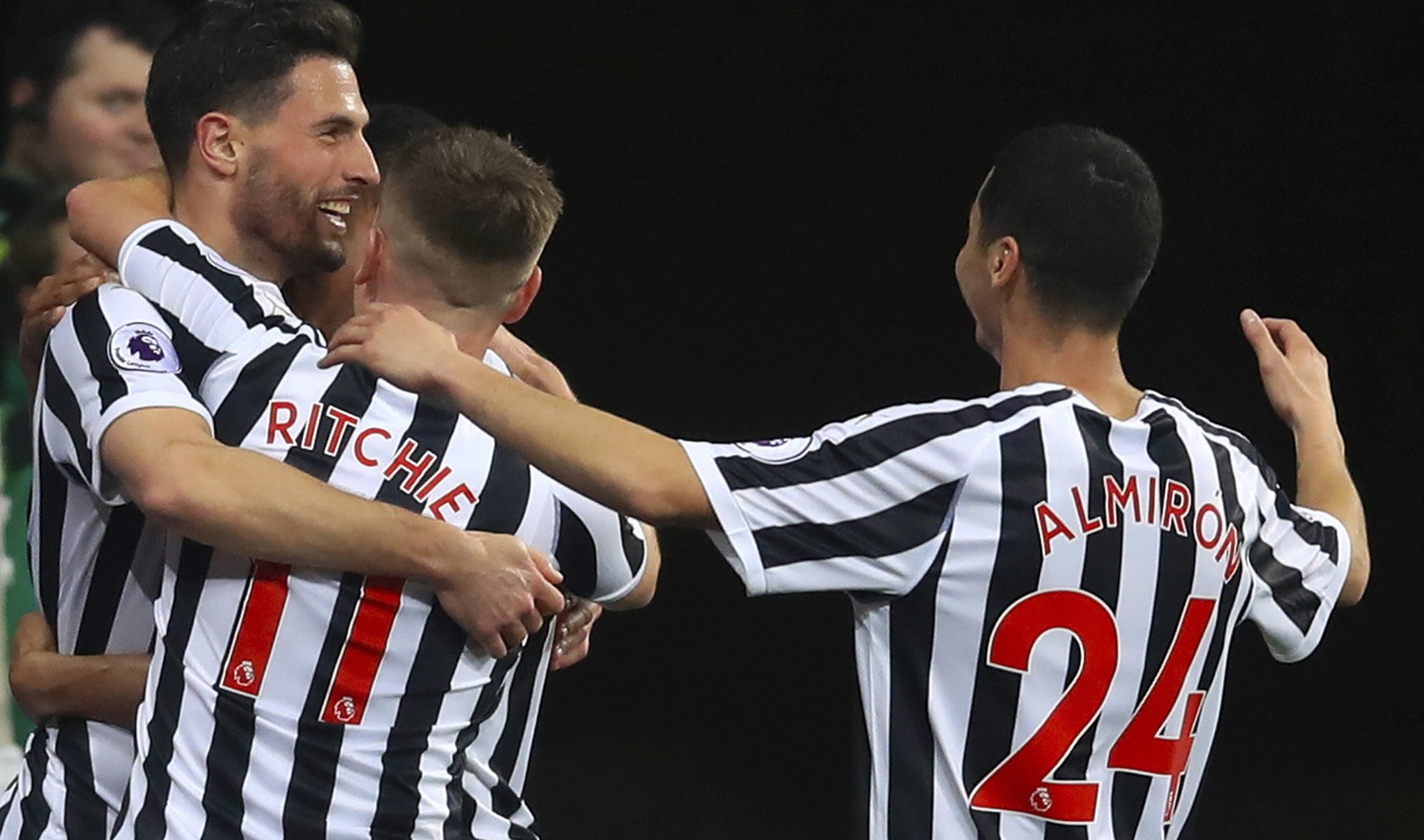 Newcastle United&#039;s Fabian Schar, left, celebrates scoring his side&#039;s first goal of the game with team mates , during the English Premier League soccer match between Newcastle and Burnley, at ...