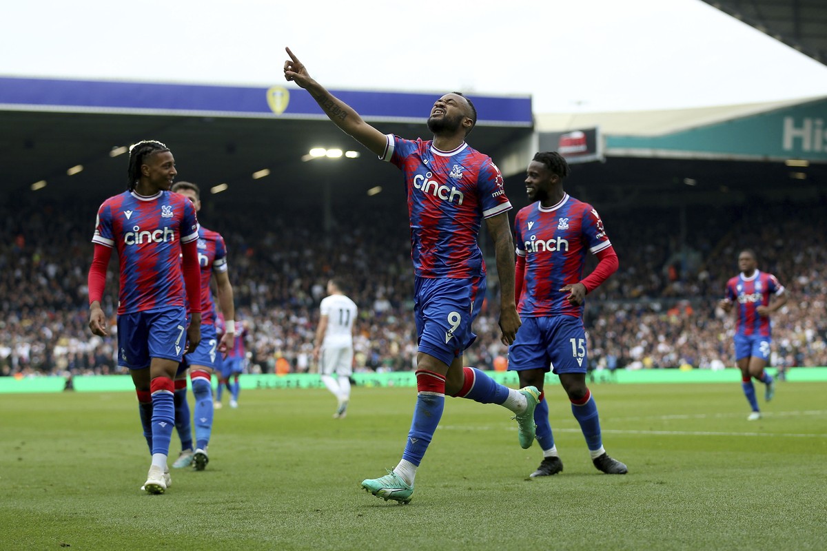 Crystal Palace's Jordan Ayew, centre, celebrates after scoring his side's second goal, during the English Premier League soccer match between Leeds United and Crystal Palace at Ellend Road,  ...