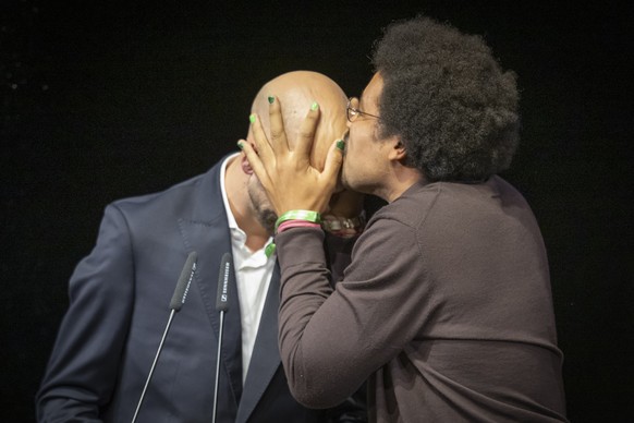 Swiss Screenwriter Dino Brandao, right, and Swiss Director Moris Freiburghaus, left, celebrate after winning the Golden Eye Award for the film &quot;I Love You, I Leave You&quot; in the documentary fi ...