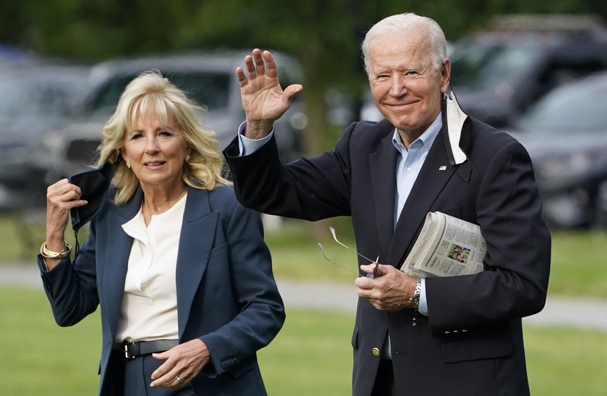 President Joe Biden and first lady Jill Biden walk to board Marine One for his first international trip as President, Wednesday, June 9, 2021, in Washington. (AP Photo/Evan Vucci)
Joe Biden