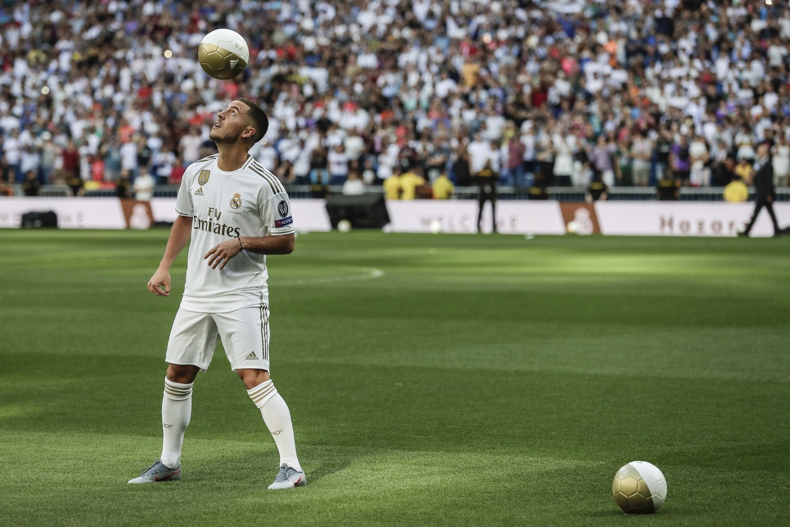 Belgium forward Eden Hazard during his official presentation after signing for Real Madrid at the Santiago Bernabeu stadium in Madrid, Spain, Thursday, June 13, 2019. Real Madrid announced last week t ...