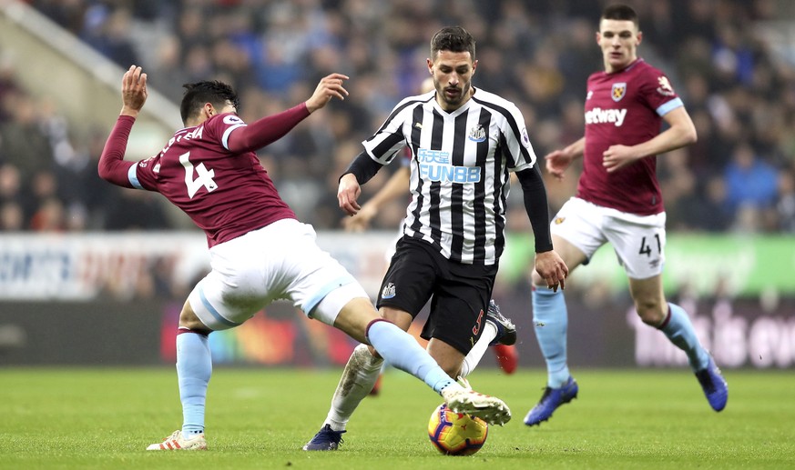 West Ham United&#039;s Fabian Balbuena, left, and Newcastle United&#039;s Fabian Schar bviefor the ball during the English Premier League soccer match between Newcastle United and West Ham United at S ...