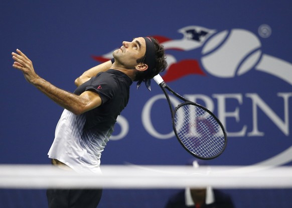 Roger Federer, of Switzerland, serves in a quarterfinal against Juan Martin del Potro, of Argentina, at the U.S. Open tennis tournament in New York, Wednesday, Sept. 6, 2017. (AP Photo/Kathy Willens)