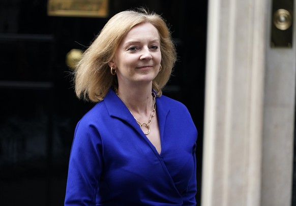 FILE - Britain&#039;s new Foreign Secretary Liz Truss leaves 10 Downing Street, in London, Wednesday, Sept. 15, 2021. Prime Minister Boris Johnson has announced the appointment of Foreign Secretary Li ...