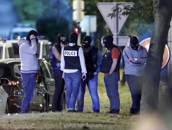French policemen take part in a police raid in Boussy-Saint-Antoine near Paris, France, September 8, 2016. French police investigating the abandonment of a car packed with gas cylinders near Paris&#03 ...