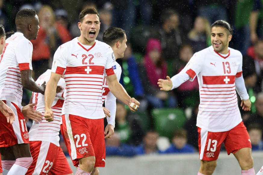 Switzerland&#039;s defender Ricardo Rodriguez, right, celebrates after scoring the 0:1 with Switzerland&#039;s defender Fabian Schaer, left, during the 2018 Fifa World Cup play-offs first leg soccer m ...