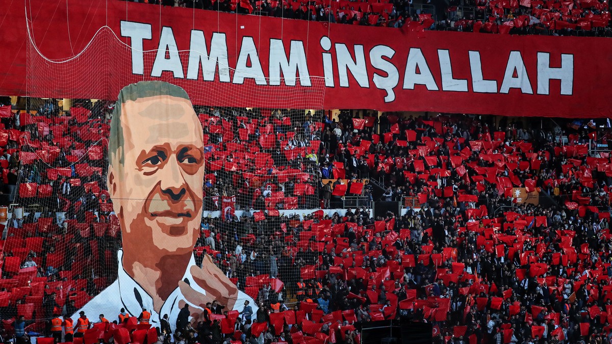 epa10332710 Supporters of the Turkish President Recep Tayyip Erdogan take a part in a choreography during his 'Unity, Will, Victory' rally at the Galatasaray's Nef Stadium in Istanbul,  ...
