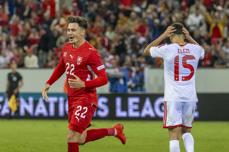 Players from Switzerland with Fabian Rieder, right, reacts after the 1:0 goal at the UEFA Nations League B of Group 1 soccer match between Switzerland and North Macedonia at the Thermoplanarena in Luz ...