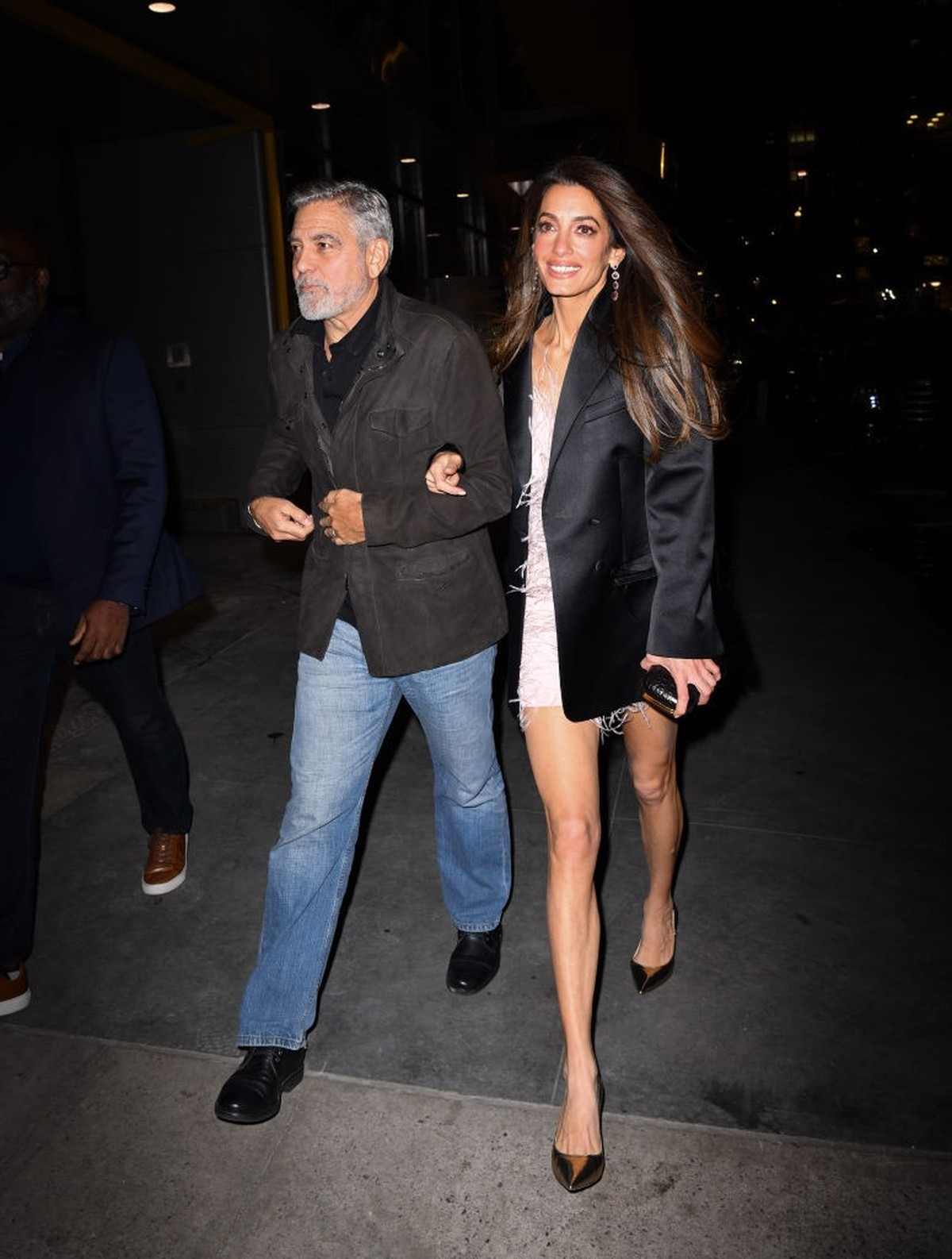 NEW YORK, NEW YORK - DECEMBER 13: George Clooney and Amal Clooney arrive to the Polo Bar on December 13, 2023 in New York City. (Photo by James Devaney/GC Images)