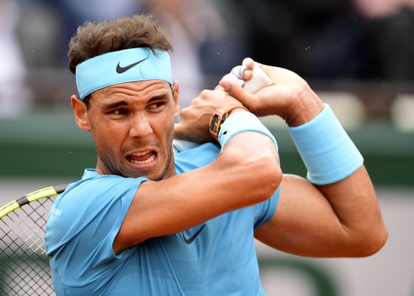 epa06771160 Rafael Nadal of Spain wins against Simone Bolelli of Italy in their menâs first round match during the French Open tennis tournament at Roland Garros in Paris, France, 29 May 2018. EPA/C ...