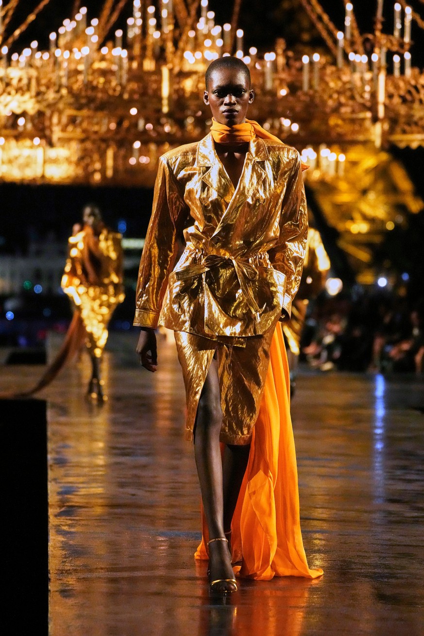 A model wears a creation as part of the Saint Laurent Womenswear Spring Summer 2027 collection presented in Paris, France, Tuesday, Sept. 29, 2026. (AP Photo/Teresa Suarez)
Paris Fashion Saint Laurent ...