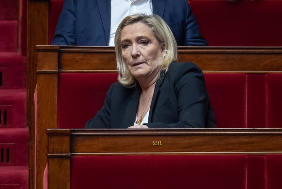 epa11754646 French member of Parliament and leader of far-right party &#039;Rassemblement National&#039; Marine Le Pen attends the weekly session of questions to the government, at the National Assemb ...