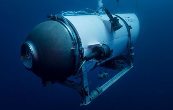 FILE - This undated image from OceanGate Expeditions in June 2021 shows the company's Titan submersible.  The wrecks of the Titanic and Titan lie on the ocean floor separated by 1600...