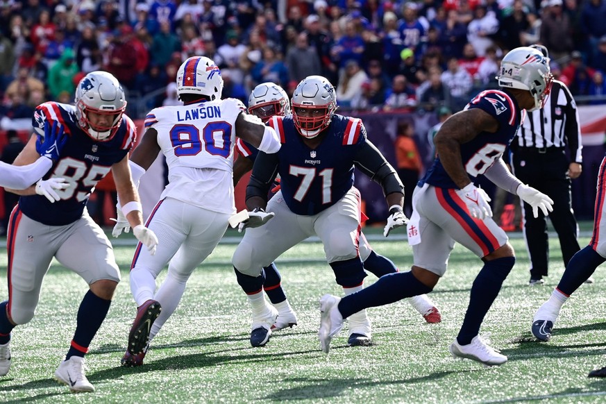 Oct 22, 2023 New England Patriots guard Mike Onwenu 71 focuses on Buffalo Bills defensive end Shaq Lawson 90 during the second half in Foxborough, Massachusetts. /Cal Media Foxborough USA - ZUMAc04_ 2 ...