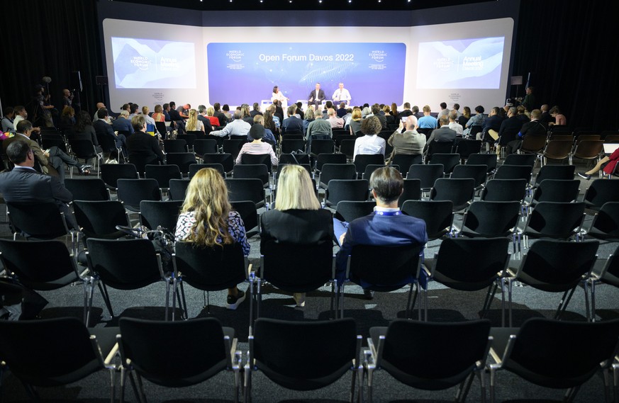 Participants listen during a panel session of the Open Forum during the 51st annual meeting of the World Economic Forum, WEF, in Davos, Switzerland, on Monday, May 23, 2022. The forum has been postpon ...