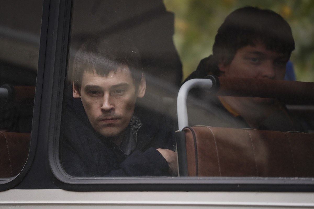 epa10211769 Russian conscripted men in a bus before being sent to a military unit from a recruiting office during Russia's partial military mobilization in Moscow, Russia, 27 September 2022. Russ ...
