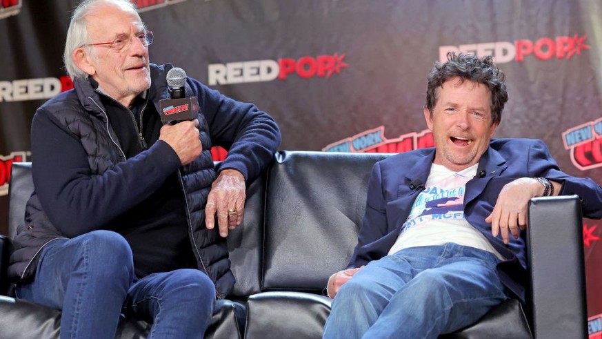 NEW YORK, NEW YORK - OCTOBER 08: Actors Christopher Lloyd (L) and Michael J. Fox attend a &quot;Back To The Future Reunion&quot; panel at New York Comic Con on October 08, 2022 in New York City. (Phot ...