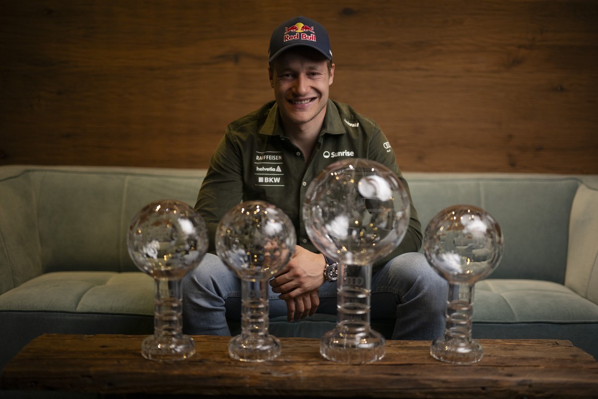 Marco Odermatt of Switzerland poses with his crystal globes for Giant Slalom, Super-G, Downhill, and Overall, after the men's downhill race at the FIS Alpine Skiing World Cup finals in Saalbach-H ...